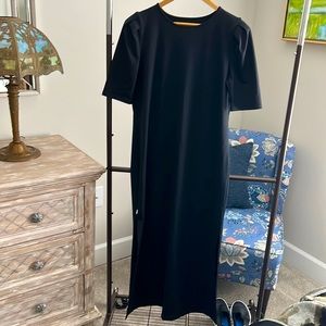 Dudley Stephens black long dress with side slits.